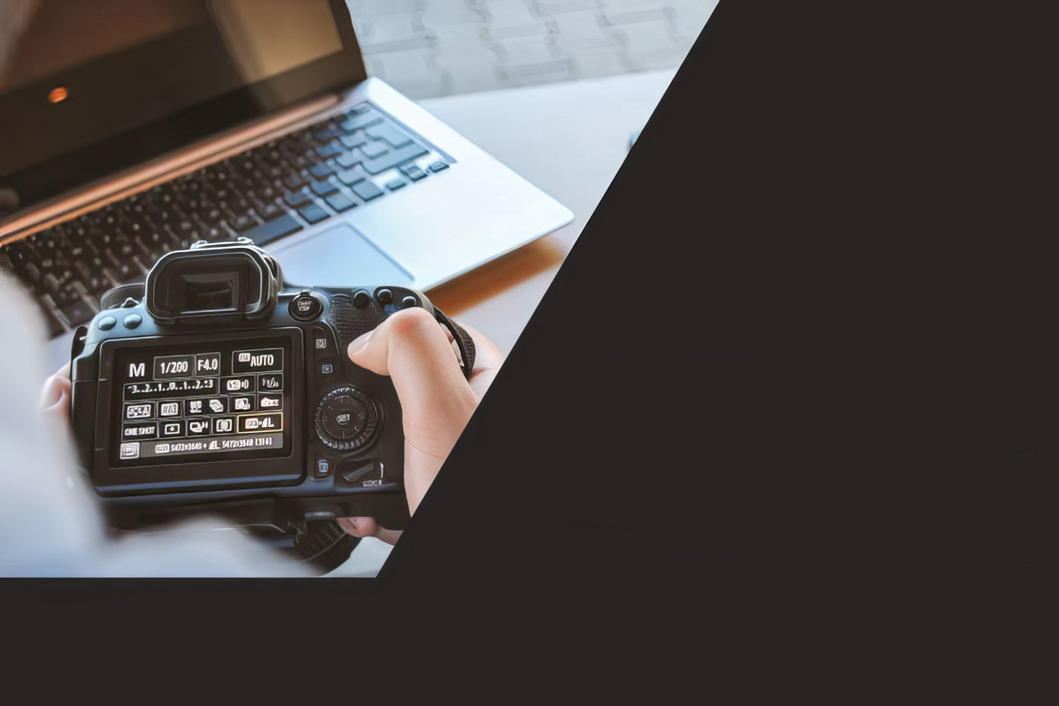 Camera, laptop and Colin Myers Photography branding